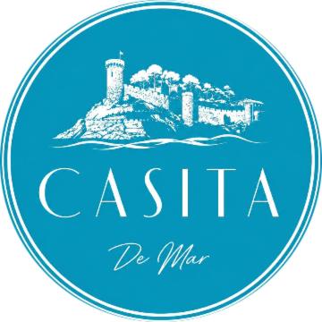 a blue sign with a drawing of a city at Casita de Mar in Tossa de Mar