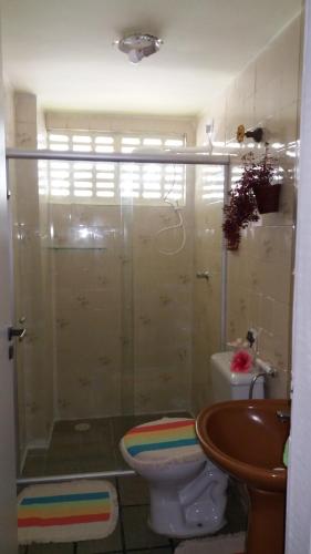 Ванная комната в Suíte Fiore Ponta Verde