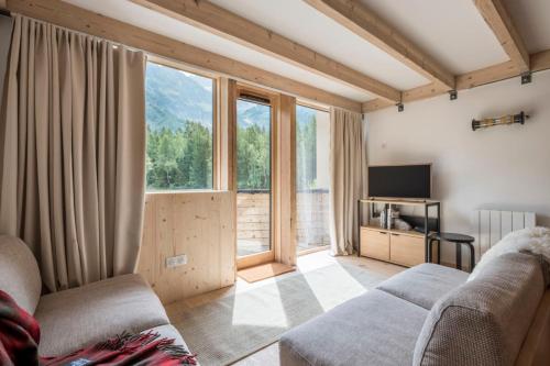 Renovated duplex with a balcony and parking space