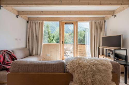 Renovated duplex with a balcony and parking space