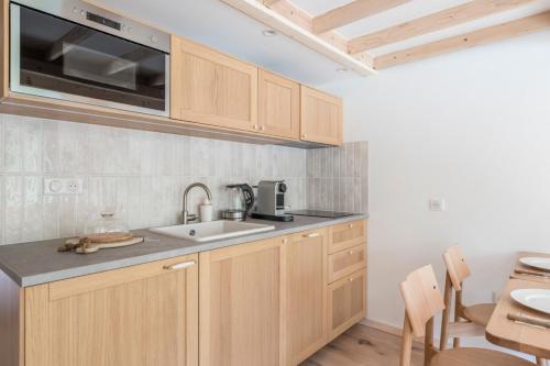 Renovated duplex with a balcony and parking space