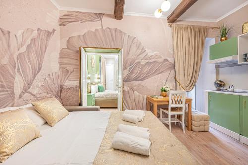a bedroom with a large bed in a room at MInerva Pantheon Suites in Rome