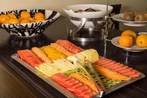 a tray of different types of vegetables on a table at Seehotel Grüner Baum in Hallstatt