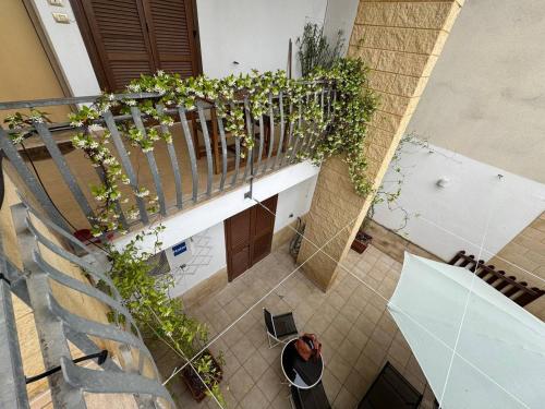 an overhead view of a person sitting at a table at Apartment Simone in Lecce