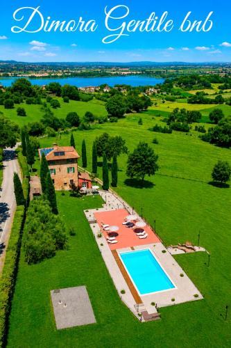 an aerial view of a estate with a swimming pool at Dimora Gentile BnB in Castiglione del Lago