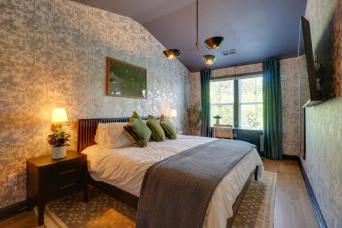 a bedroom with a large bed in a room at Dock Access! 'Hook & Heron Lakefront Getaway' in Greenwood