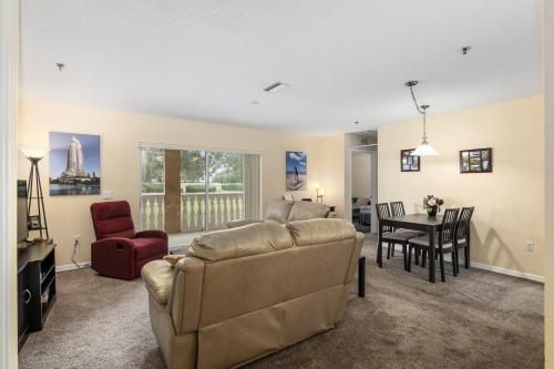 a living room with a couch and a table at Condominium at Lakeside Golf & CC - unit 104 apts in Inverness