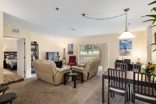 a living room with two chairs and a couch at Condominium at Lakeside Golf & CC - unit 104 apts in Inverness