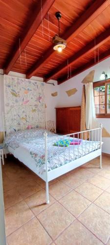 a bedroom with a bed in a room at Middle Earth in El Paso
