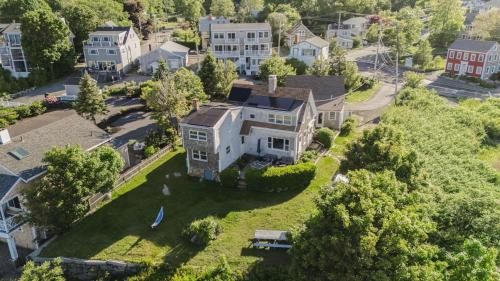 an aerial view of a house in a residential neighborhood at The Rockporter in Rockport