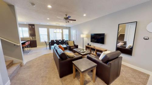 a living room with a couch and a table at Entrada at Moab #628 in Moab