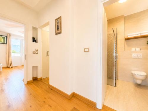 a bathroom with a toilet and a shower at Alex Apartments in Budva