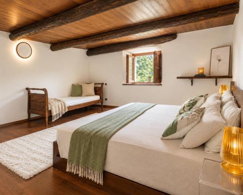 Llit o llits en una habitació de Chalet Tranquillo