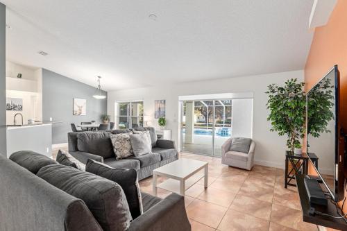 a living room with a couch and a table at North Timucuan Trail Villa 1208 in Hernando