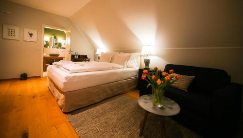 Postel nebo postele na pokoji v ubytování Alwine - Landhaus an den Spreewiesen
