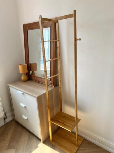 a dressing table with a mirror on top of a dresser at At Number 36 in London