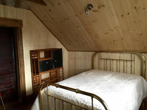 Ένα ή περισσότερα κρεβάτια σε δωμάτιο στο Maison du lac