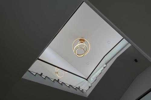 a skylight in a ceiling with two rings at 7 Pearls in Gajendragarh