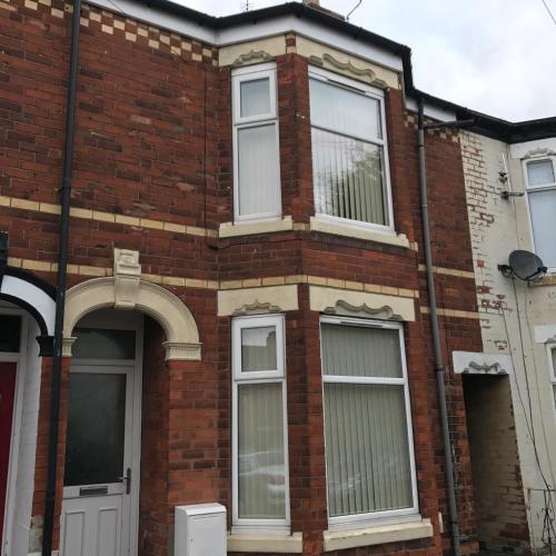 a red brick house with white windows at Fantastic House with Amenities in Hull