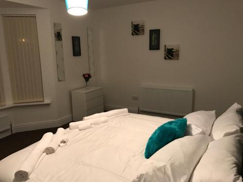 Llit o llits en una habitació de JO Wordsworth Apartment
