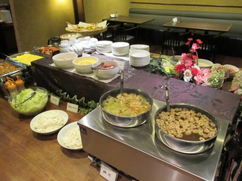 a buffet line with many different types of food at Hotel Crown Hills Kokura in Kitakyushu
