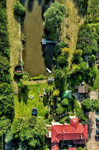 an aerial view of a park with a body of water at A morze! Agroturystyka Nowy Kraków pod Darłowem in Jeżyce