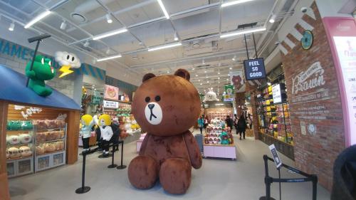 a large teddy bear sitting in the middle of a store at Seoul Grand Hostel EWHA Univ in Seoul