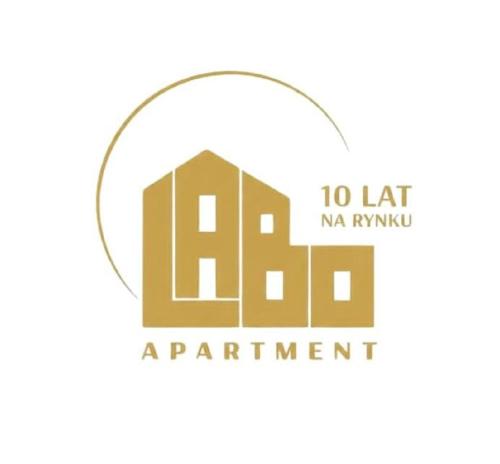 a logo for a apartment building with a circle around it at Labo Apartment - apartamenty Plac Konstytucji in Warsaw