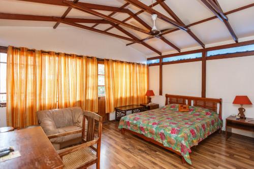 Un ou plusieurs lits dans un hébergement de l'établissement Casa Cottage