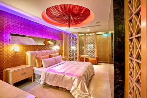 Ein Bett oder Betten in einem Zimmer der Unterkunft Gold Motel