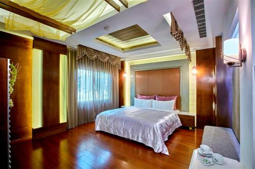 Ein Bett oder Betten in einem Zimmer der Unterkunft Gold Motel