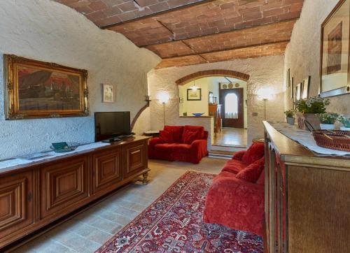 Coin salon dans l'établissement Podere il Giurato