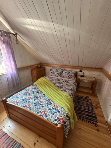a bedroom with a bed in a room at Siedlisko Urszulanka Dom in Policzna