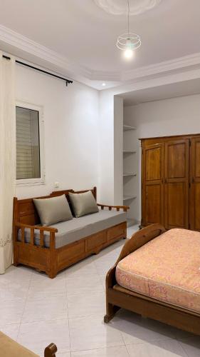 a bedroom with two beds in a room at Villa Korba 1st Floor in Korba