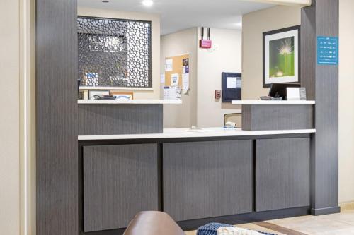 a waiting room at a hospital with a counter at Candlewood Suites Killeen - Fort Hood Area by IHG in Killeen