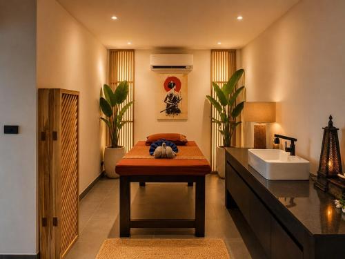 a bathroom with a sink and a counter with a sink at Villa Veha, Koh Samui Resort & Free Spa, Fitness, Massage room, Espace game in Koh Samui
