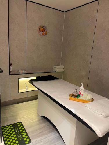 a room with a table with a tray on it at Al-TARABOT HOTEL in Muscat