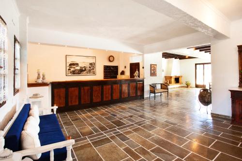 a living room with a couch and a table at Stellina Hotel in Skiathos