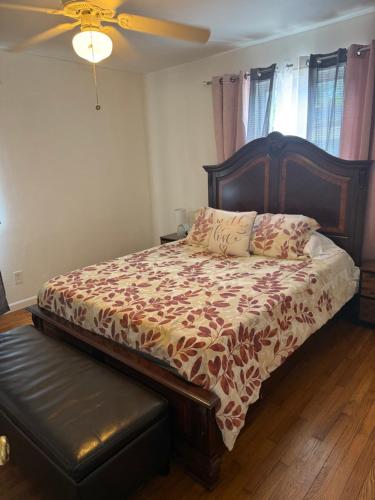a bedroom with a bed and a ceiling fan at Rest apartment in Jacksonville