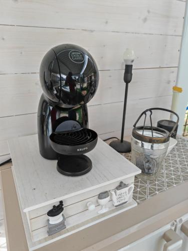a coffee maker sitting on top of a counter at Villa Shiva Cerveteri, Casa Vacanze con SPA e Idromassaggio, Relax a due passi da Roma in Cerveteri