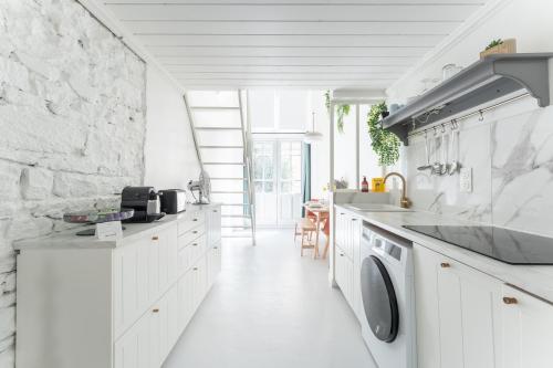 Urban White - loft lumineux avec terrasse