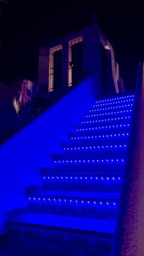 a set of stairs with blue lights on them at Casa Infinidad in Moraira