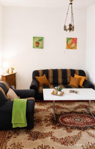 a living room with a couch and a table at Bonita in Mostar