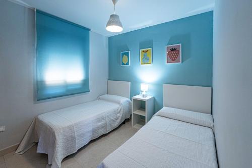 Apartment in Nerja with Pool & Private Parking