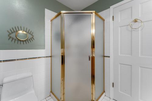 a shower stall in a bathroom with a mirror at Baskets, Brews & Views: Epic Wenatchee Escape! in Wenatchee