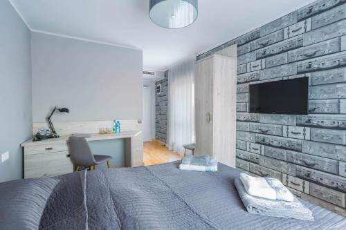 TV a/nebo společenská místnost v ubytování MOTEL MO&JA