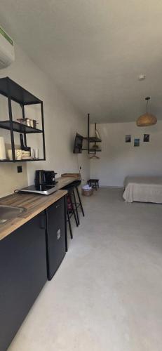 a room with two desks and a bed at Syros Blue Lagoon G2 in Galissas