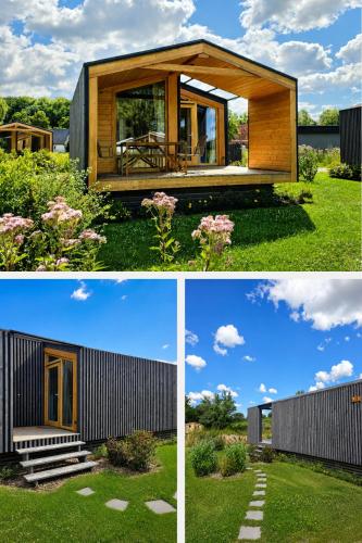 two different views of a modern house at 401 Ruhiges Tiny House mit Wiese in Bleckede