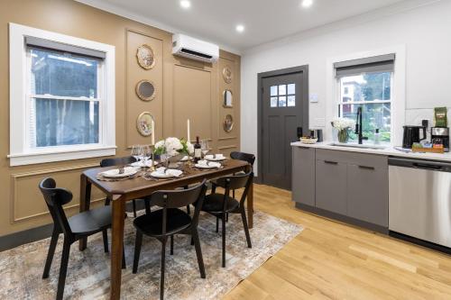 a kitchen and dining room with a table and chairs at Cambridge Designer Home Harvard MIT Boston in Cambridge