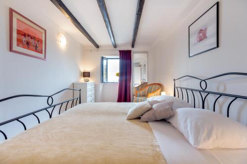 Кровать или кровати в номере Villa Ostrinus VH VIII